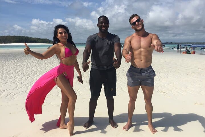 Zanzibar Dolphin Tour — Ethical Dolphin Swim, Snorkel & Island Picnic photo 1