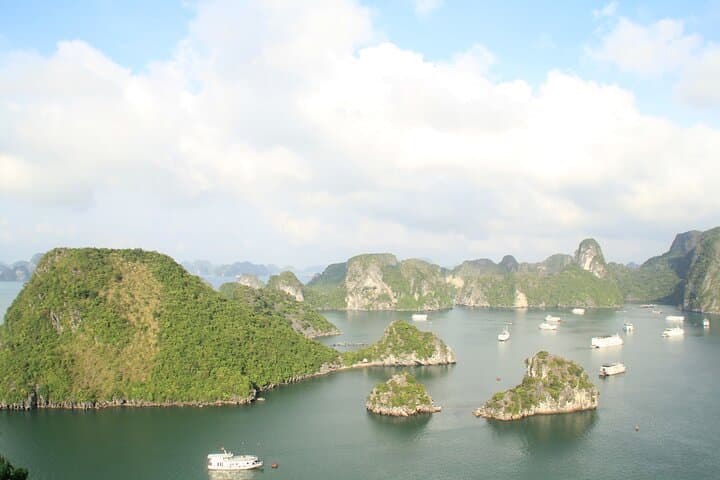 Day Cruise in Halong Bay: Kayaking, Titop Island & Surprise Cave Adventure