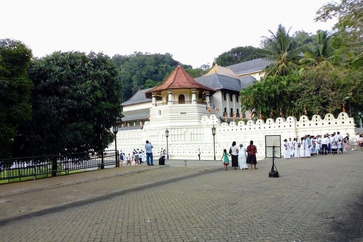 2-Day Sigiriya, Dambulla & Kandy Cultural Tour — Sigiriya Rock, Dambulla Cave Temple, Temple of the Tooth photo 3