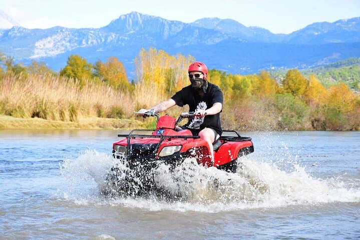 Taurus Quad Safari from Side: ATV Trails Through Pines, Mud and Mountain Streams