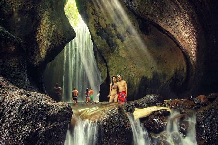 Sunrise at Lempuyang Gate: Tirta Gangga & Tukad Cepung Waterfall Day Tour from Ubud