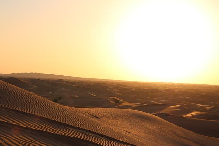 Sunset Dunes: Dubai Desert Safari with Dune Bashing, Camel Ride & BBQ photo 4
