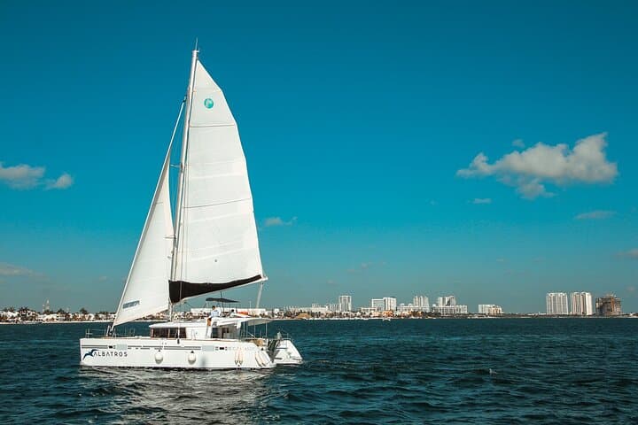 Deluxe Catamaran to Isla Mujeres: Snorkel, Beach Club & Open Bar Experience photo 4