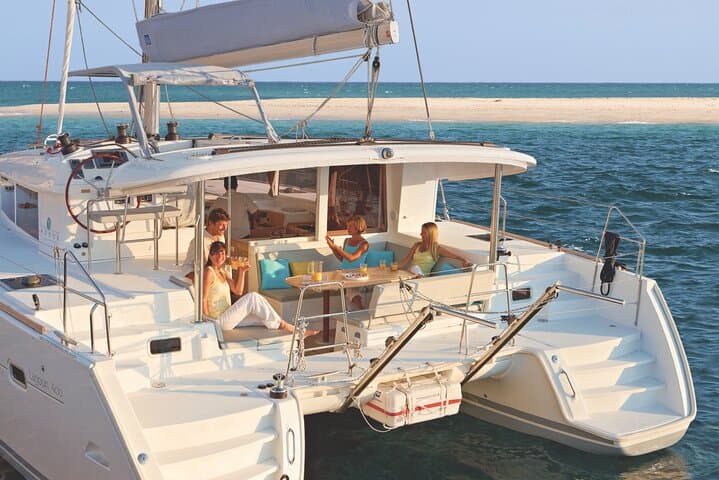 Private Half-Day Catamaran Tour in Ria Formosa — Swim, Snorkel & Paddle photo 2