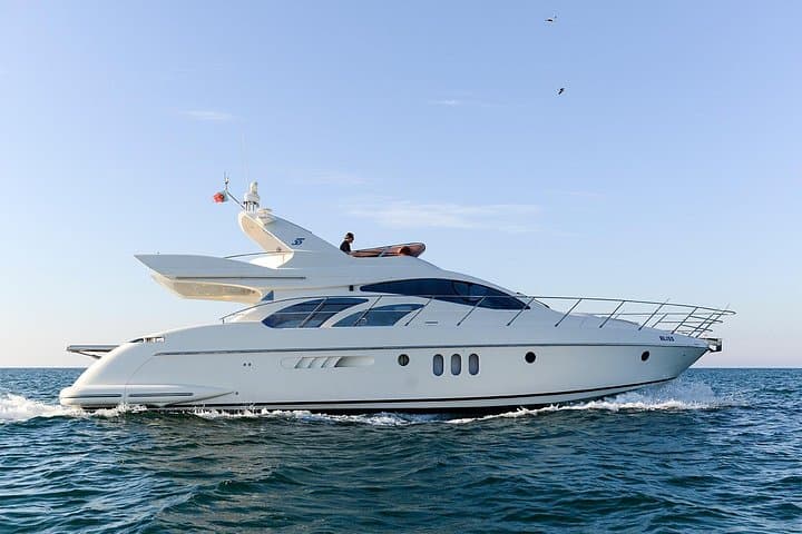 Luxury Yacht Charter to Benagil Caves: Coastal Cruise from Vilamoura