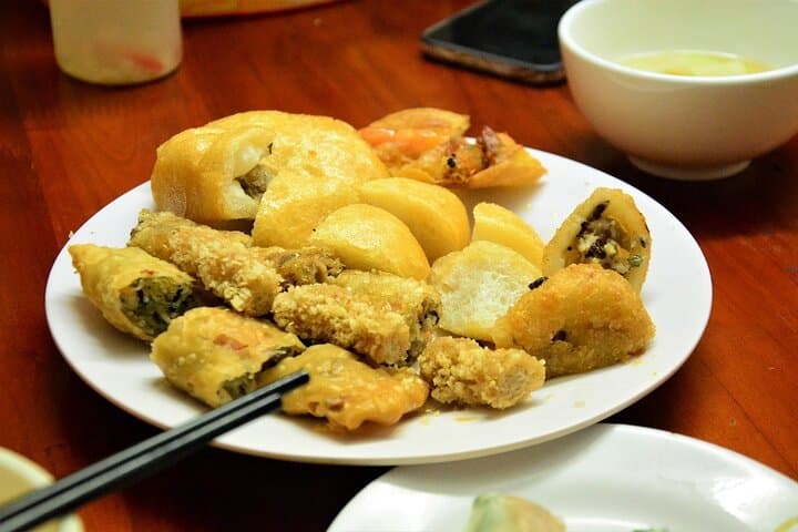 Night Vespa Street-Food Tour of Hanoi’s Old Quarter & West Lake photo 6