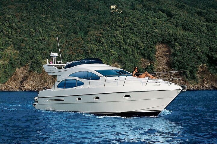 Private Flybridge Yacht Cruise Around Santorini Caldera — Swim, Snorkel & Sunset photo 2