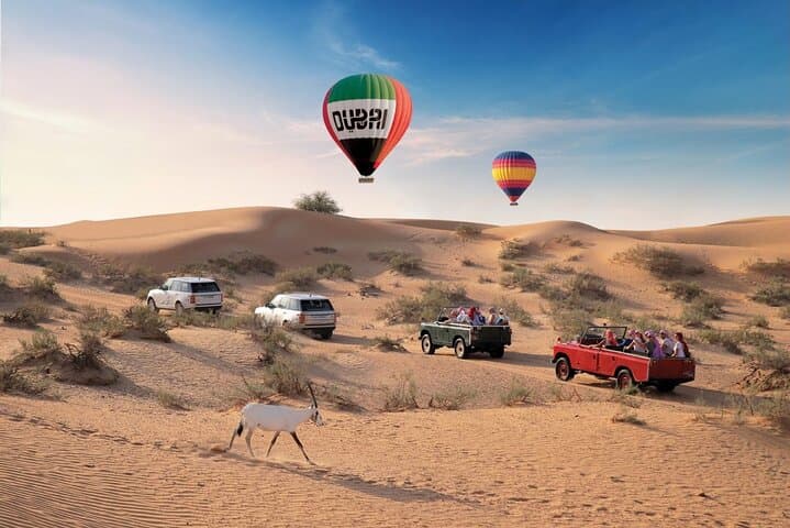 Sunrise Hot Air Balloon Over Dubai Desert with Vintage Land Rover Breakfast