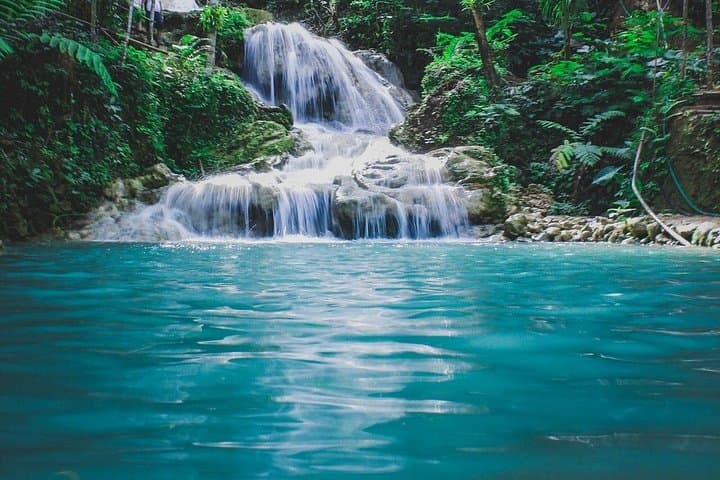 Martha Brae Bamboo Rafting and Blue Hole Ocho Rios Combo — River Rafting & Waterfall Swim from Montego Bay photo 2