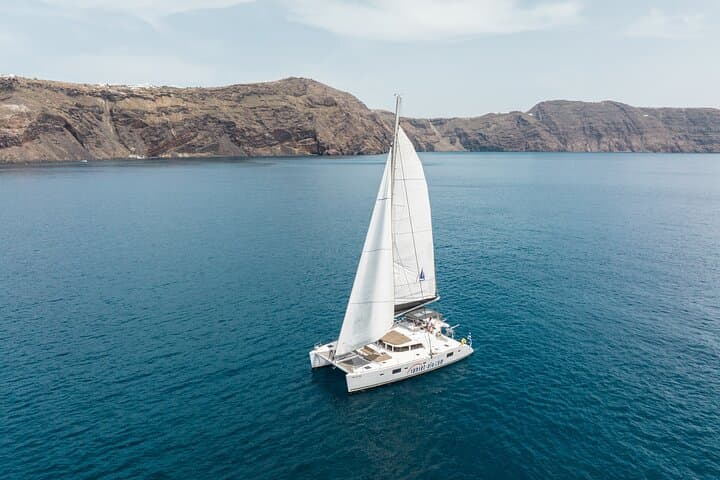 Santorini Luxury Catamaran Cruise: Hot Springs, Red & White Beaches, BBQ Lunch