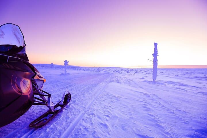 Snowmobile to Lainio SnowVillage: Half-Day Snowcastle Tour from Levi photo 2