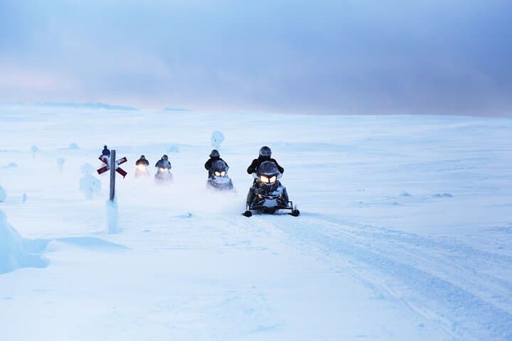 Snowmobile to Lainio SnowVillage: Half-Day Snowcastle Tour from Levi photo 4
