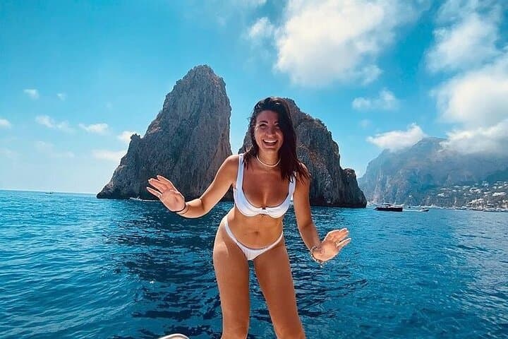 Private Capri Boat Tour: Hidden Caves, Blue Grotto & Swimming Stops photo 4
