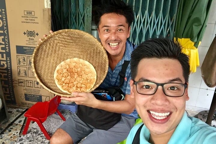 Saigon Scooter Street Food Tour: Unseen Districts & Night Eats photo 6