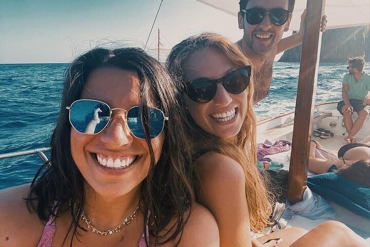 Private Capri Boat Tour: Hidden Caves, Blue Grotto & Swimming Stops photo 3