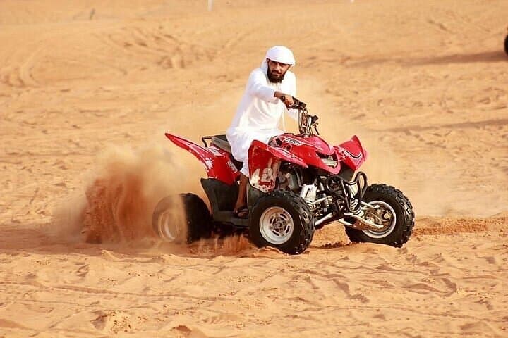 Dubai Desert Safari: Quad Biking, Dune Bashing & Premium BBQ Camp Experience