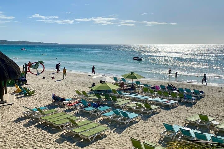 Experience the Ultimate Beach Day in Negril: Sand, Surf, and Sunsets