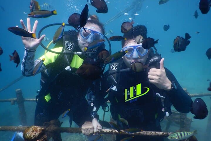 Private Nusa Dua Water Activities + 90-Min Balinese Massage — Parasail, Jet Ski & Diving photo 2