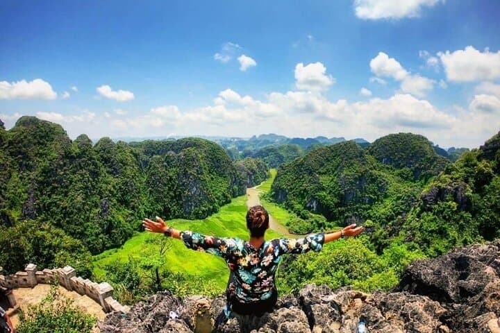Day Trip to Trang An, Hoa Lu & Mua Cave from Hanoi — Boat Caves and Summit Views photo 5