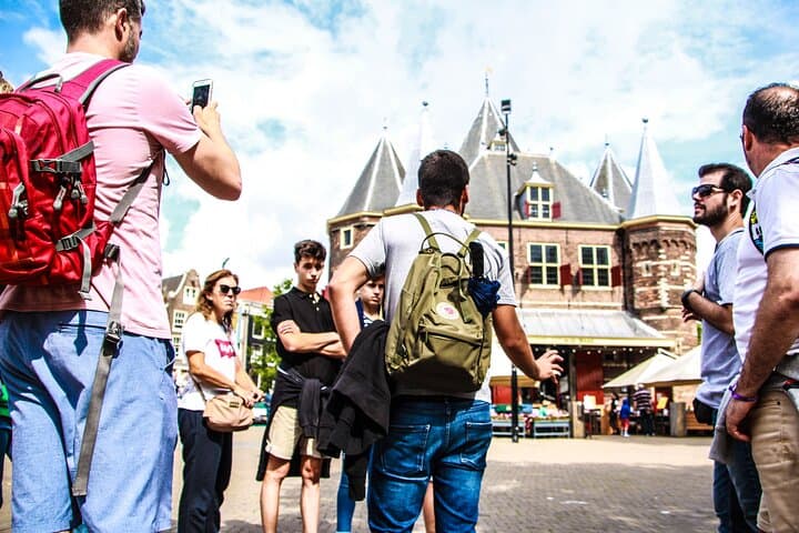 Walk Amsterdam's Canals: Guided City Stroll + Canal Cruise with Drinks & Cheese Tasting