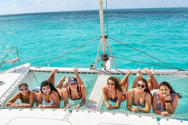 Adults-Only Catamaran to Isla Mujeres — Beach Club Buffet, DJ & Snorkel photo 2