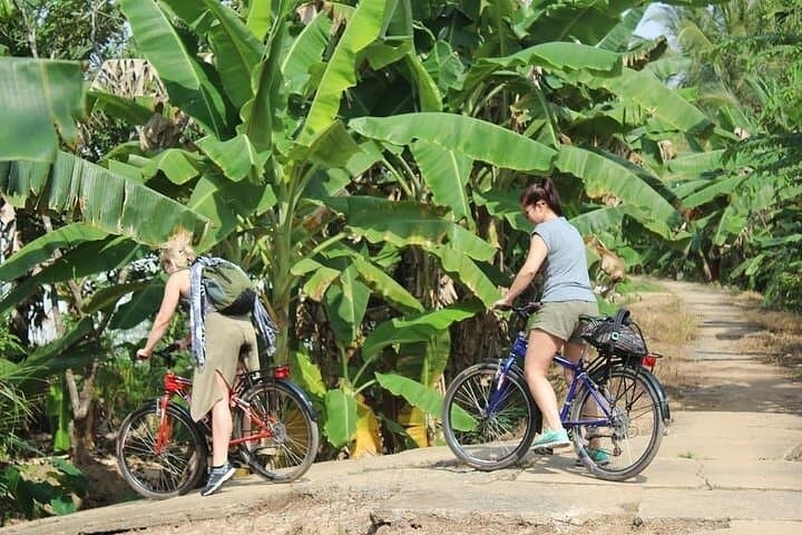 Mekong Delta Day Bike Tour from Ho Chi Minh — Ben Tre Coconut Village Experience photo 2