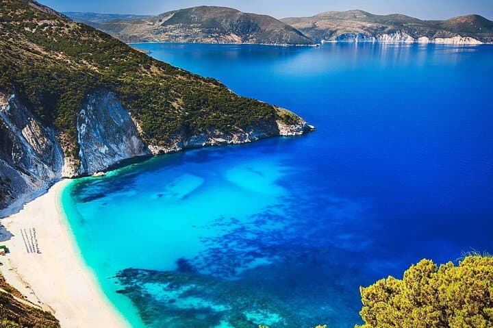 Melissani Lake & Drogarati Cave Half-Day: Boat Ride, Stalactites and Myrtos Beach Swim