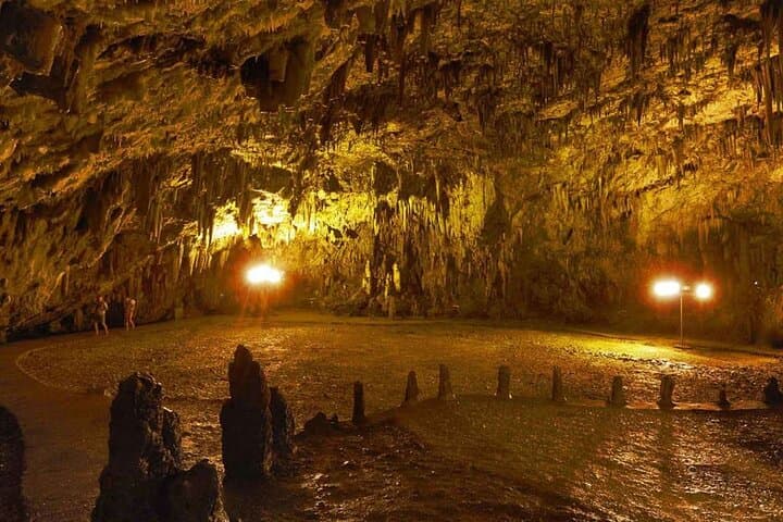 Melissani Lake & Drogarati Cave Half-Day: Boat Ride, Stalactites and Myrtos Beach Swim photo 2