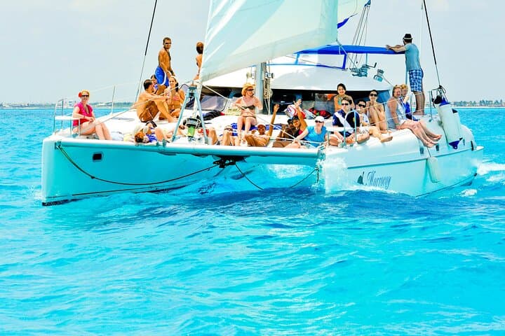 Catamaran to Isla Mujeres: Snorkel, Open Bar & Beach Club Day Trip from Cancun photo 1