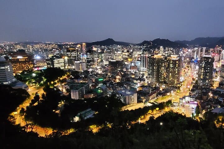 Seoul Night Tour: Hongdae Streets, Namsan Views & Local Korean BBQ photo 1