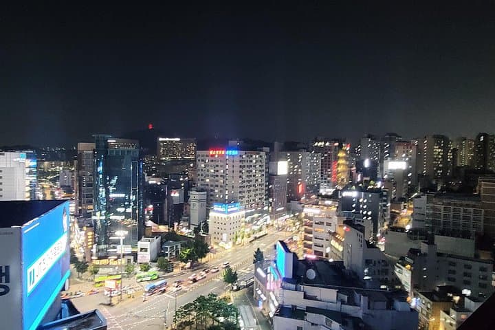 Seoul Night Tour: Hongdae Streets, Namsan Views & Local Korean BBQ photo 2