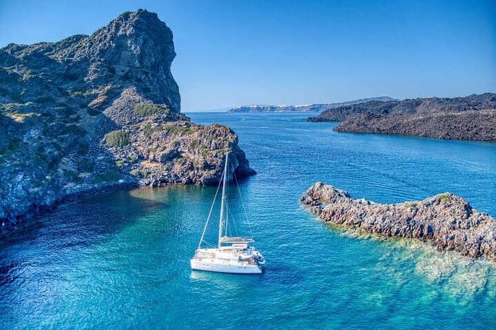 Deluxe Santorini Caldera Sailing: BBQ, Hot Springs & Snorkeling photo 2