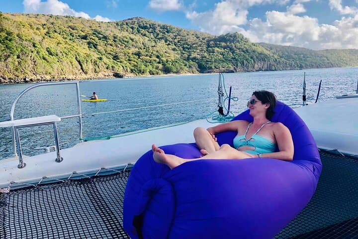 Private Skippered Catamaran Day Trip in Grenada — Snorkel, Paddleboard & Coastal Sailing photo 4