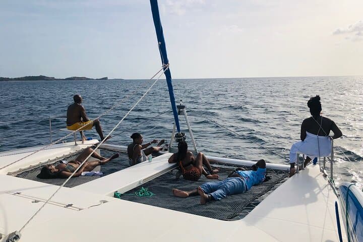 Private Skippered Catamaran Day Trip in Grenada — Snorkel, Paddleboard & Coastal Sailing photo 3