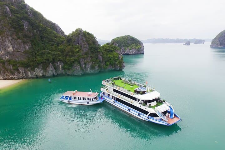 Luxury Day Cruise in Ha Long Bay: Sung Sot Cave, Titov Island & Kayaking photo 3