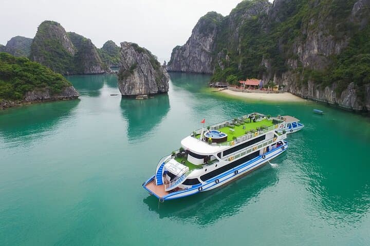 Luxury Day Cruise in Ha Long Bay: Sung Sot Cave, Titov Island & Kayaking photo 2