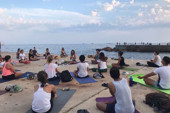 Seafront Yoga in Barcelona: Hatha Vinyasa on Barceloneta Beach photo 6