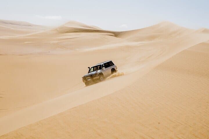 Wadi El Rayan 4x4 Desert Safari from Cairo — Dune Bashing, Sandboarding & Camel Ride