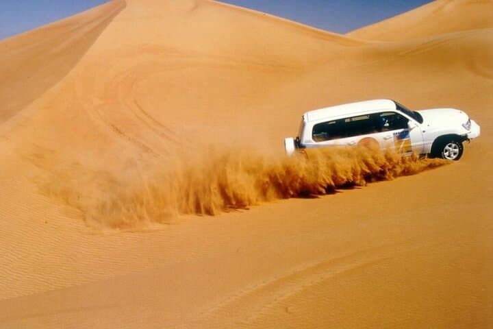 Dubai Red Dune Safari: Morning Dune Bashing, Sandboarding & Camel Ride photo 2