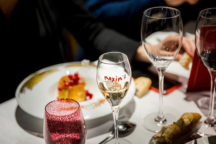Maxim's Seine Dinner Cruise in Paris — Champagne, Live Music & Panoramic Window Seats photo 3