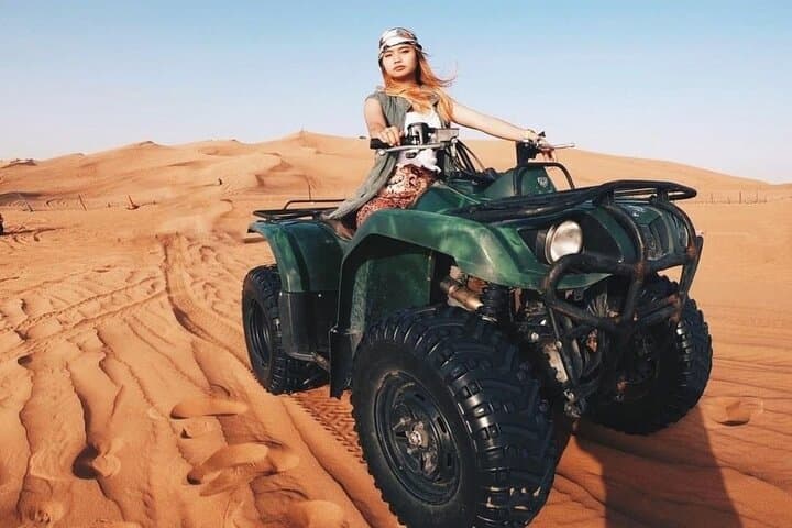 Dubai Desert Safari: Quad Bike, Camel Ride & BBQ Dinner Experience photo 2