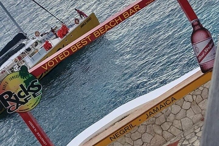 Explore Negril's 7 Mile Beach and Rick's Cafe Experience