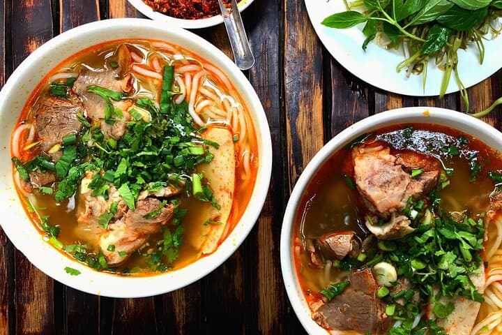 Saigon After Dark: Scooter Street-Food Tour with a Local Student photo 6