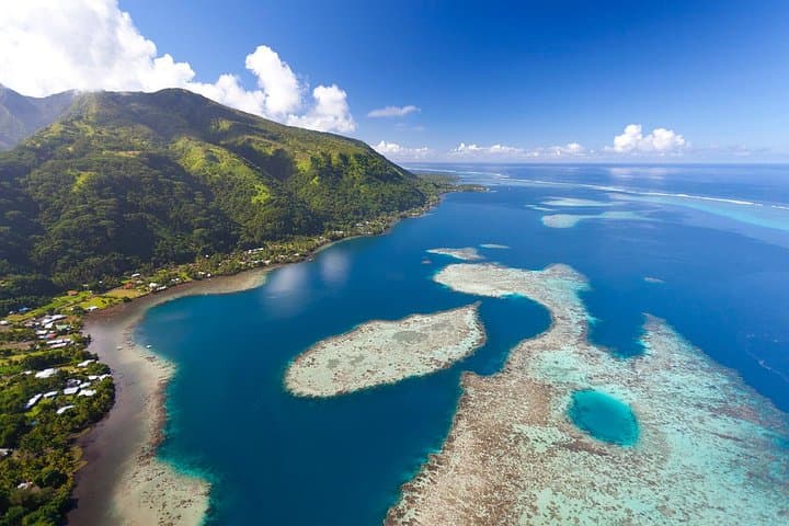 Teahupoo & Tahiti Peninsula Half-Day Boat Tour — Wave Watching, Snorkel & River Walk photo 1