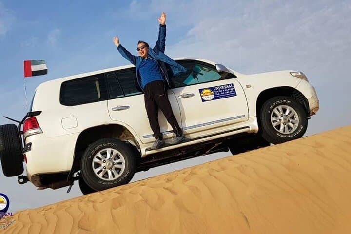 Dubai Red Dunes Desert Safari — 4x4 Dune Bashing, Camel Ride & Bedouin Camp Evening Experience photo 1