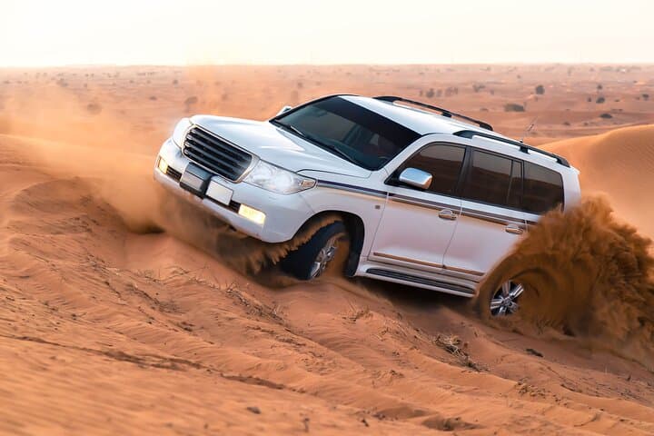 Dubai Evening Desert Safari with BBQ Dinner: Red Dune Adventure & Bedouin Camp Experience photo 3
