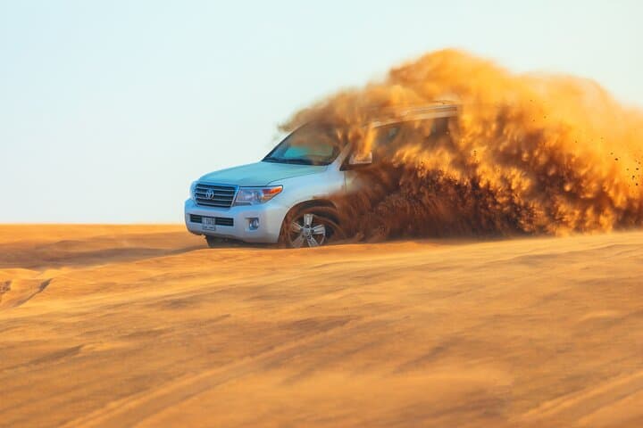 Dubai Evening Desert Safari with BBQ Dinner: Red Dune Adventure & Bedouin Camp Experience photo 4