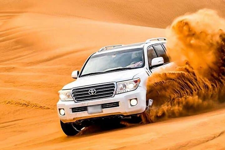 Evening Dubai Desert Safari: Dune Bashing, Camel Rides & BBQ Under the Stars photo 2