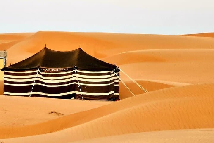 2-Day Wahiba Sands Desert Camping Tour from Muscat — Wadi Shab, Bedouin Camp & Camel Ride photo 3