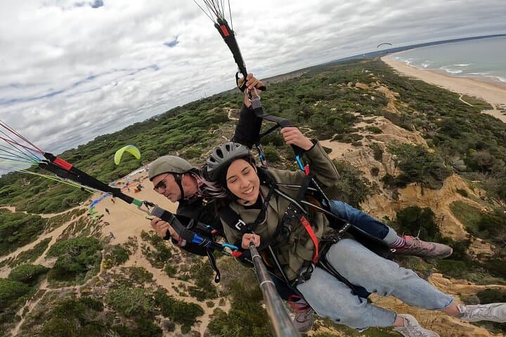Tandem Paragliding Near Lisbon: Beach Cliff Flights with Transfers